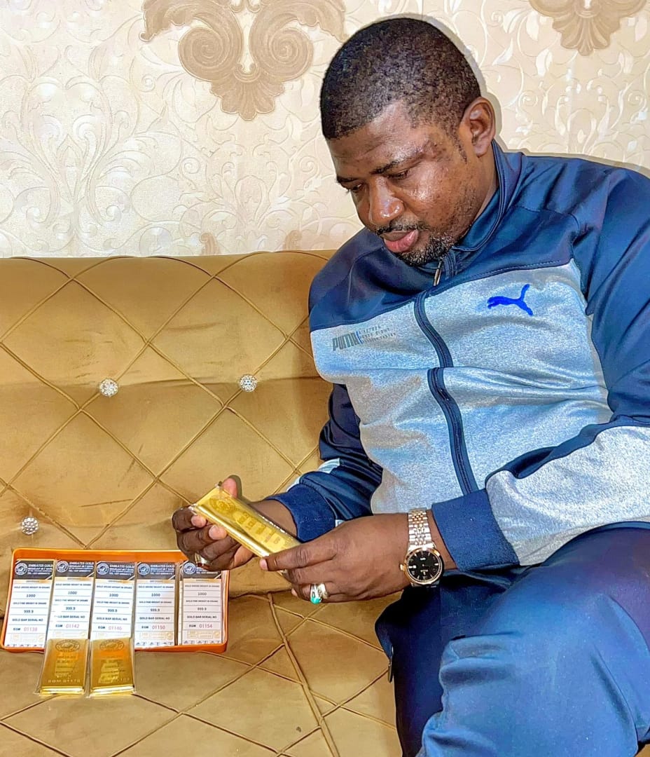 MOUHDJAF CEO presenting a collection of certified 24-karat gold bars