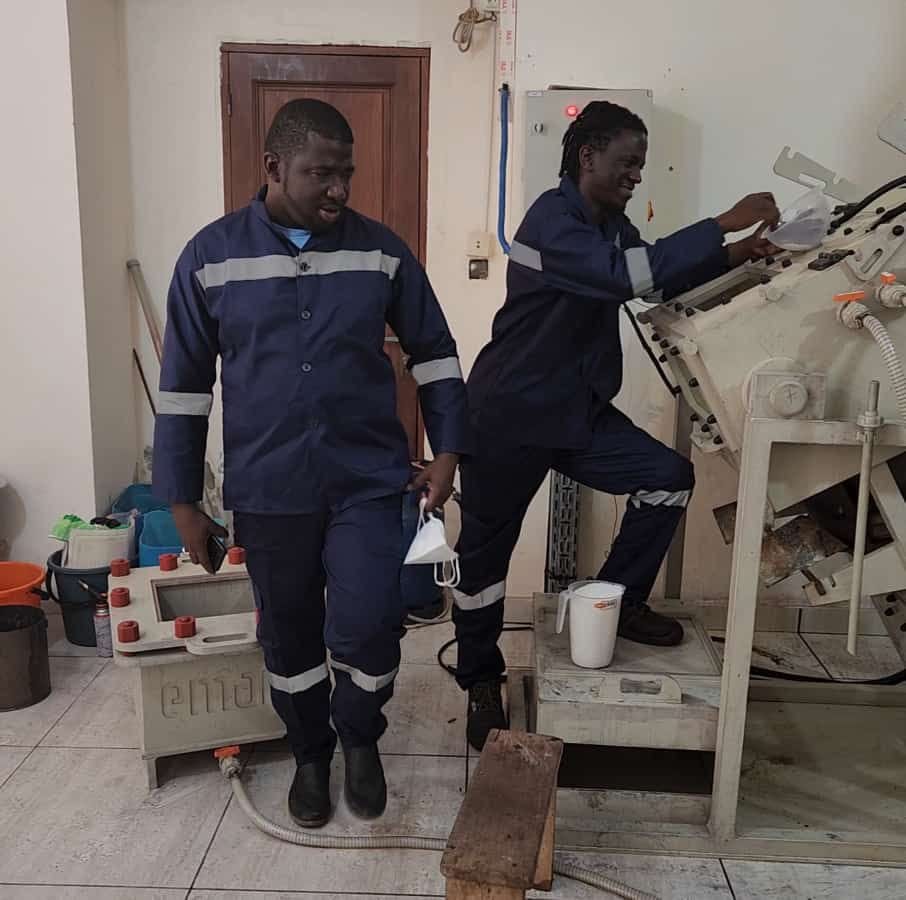 MOUHDJAF technicians operating a gold granulation and refining machine