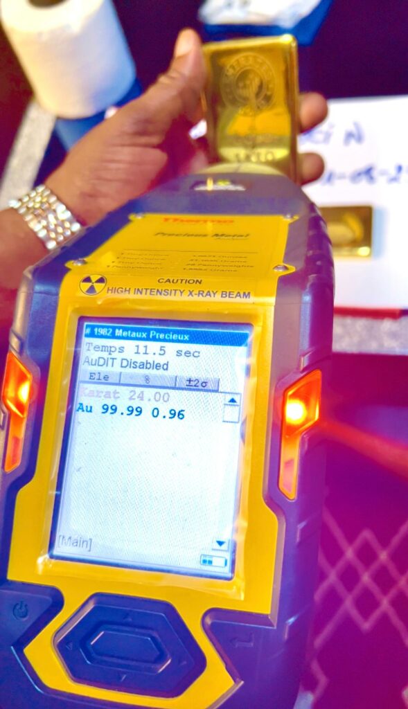 A 24-karat gold bar verified by a mass spectrometer reading 99.99 purity